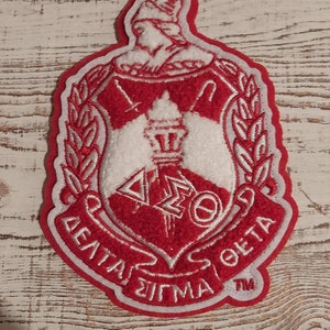 Delta Sigma Theta Chenille Crest- (2 sizes); DST crest; Red and White; Shield; OO-OOP; Newly revised (per National Protocol)