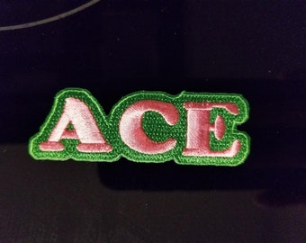 ACE iron-on embroidered 3" X 1" patch (pink/green)