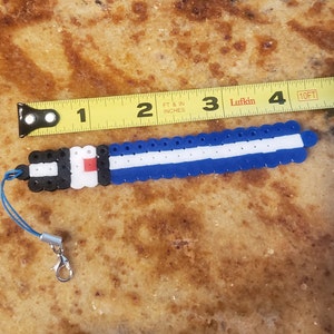 Lightsaber key chain or charm
