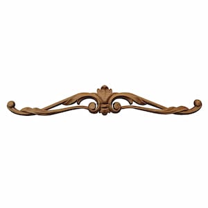 May include: A brown wooden decorative moulding featuring a symmetrical carved design with scrolling leaf patterns and a central floral motif. The piece has curved, elongated arms that taper to rounded ends, showcasing a smooth, polished wood grain finish.
