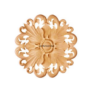Pair of Pearl with Radiant Leaf Carved Rosette Appliques