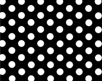 May include: Black and white polka dot pattern. White circles on a black background.