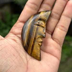 Intricate Half-Moon Carving in Tiger's Eye: A Masterpiece of Detailed Craftsmanship