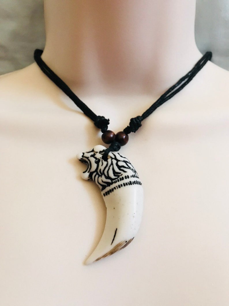Large Lion tooth shaped faux resin pendant necklace Etsy