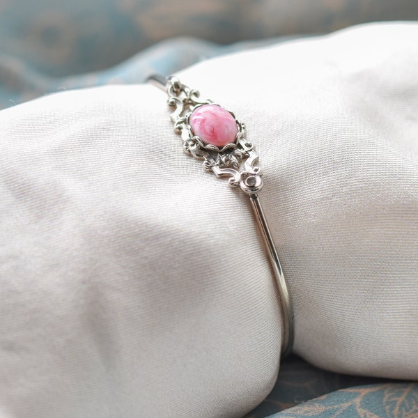 Small vintage silver-tone bangle with pink swirl stone | scroll design fastener | faux marble | late 20th century bracelet | 1990s | costume