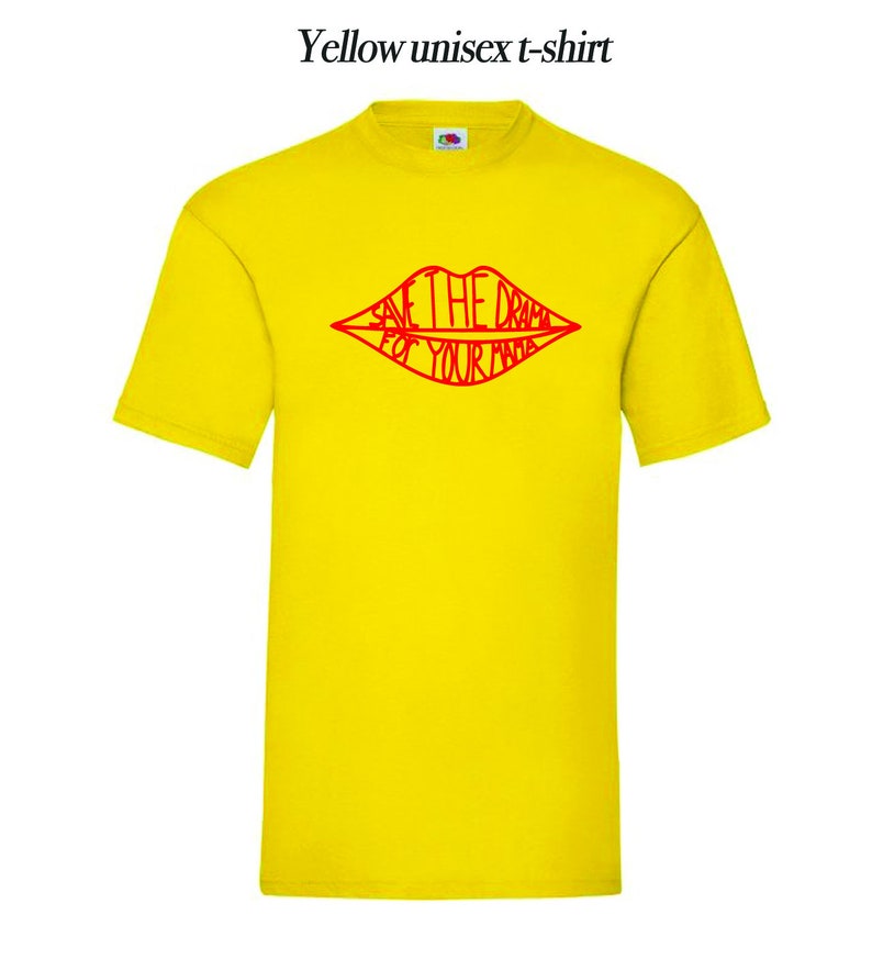 May include: Yellow unisex t-shirt with a red outline of a pair of lips that says "Save the drama for your mama".