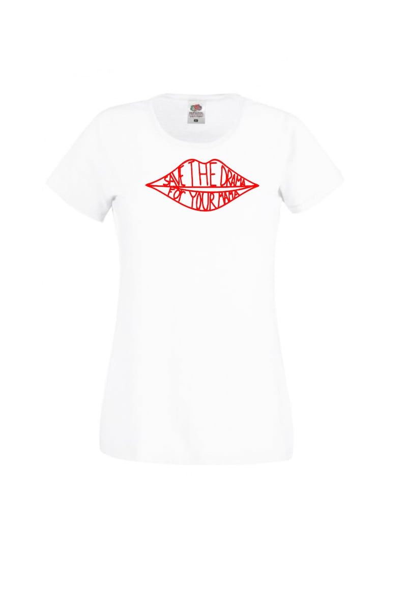 May include: White t-shirt with a red outline of a pair of lips that says "Save the drama for your mama".