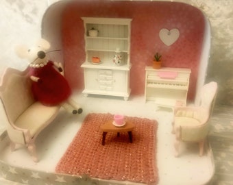 Travel doll house in suitcase with mouse