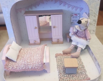Travel doll house in suitcase with mouse