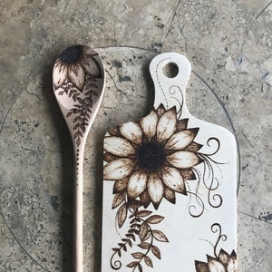 Sunflower cutting board and spoon set.  Handmade.  Wood burning.  Each one of a kind.