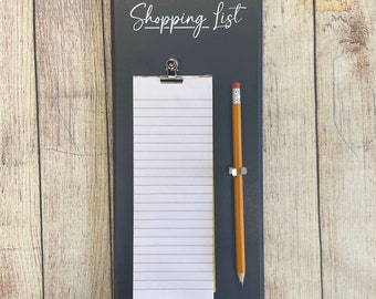 Customisable shopping list holder, slimline shopping list, tear off shopping list and and pencil holder