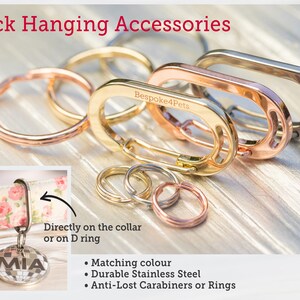 May include: A close-up of three different colored metal rings and carabiners. The rings are gold, rose gold, and silver. The carabiners are engraved with the text "Bespoke4Pets". The rings and carabiners are used for attaching dog tags or other accessories to a dog collar.