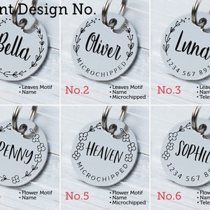 May include: A collection of six silver pet ID tags with different names and designs. Each tag is round, featuring a name in a decorative font, surrounded by a floral or leaf motif. Some tags include a phone number or the word "Microchipped".
