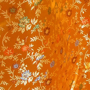 Flower pattern orange fabric jaquard sold by the meter China 90 cm wide dress fabric decorative fabric, floral ornaments, flowers and tendrils