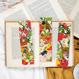 Könnte beinhalten: Vier farbenfrohe Lesezeichen mit floralen und Vogel-Illustrationen. Die Lesezeichen zeigen eine Vielzahl von Blumen, Vögeln und Insekten, darunter ein Kolibri, ein Rotkehlchen und ein Schmetterling. Die Lesezeichen sind auf dickem, strapazierfähigem Papier gedruckt.