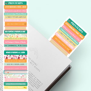 Könnte beinhalten: Ein Stapel bunter Lesezeichen mit französischem Text und floralen Illustrationen. Die Lesezeichen zeigen Titel von Büchern über Frühling und Natur. Die Lesezeichen sind in einem Stapel angeordnet, wobei das oberste Lesezeichen den Titel "PRINTEMPS" zeigt.