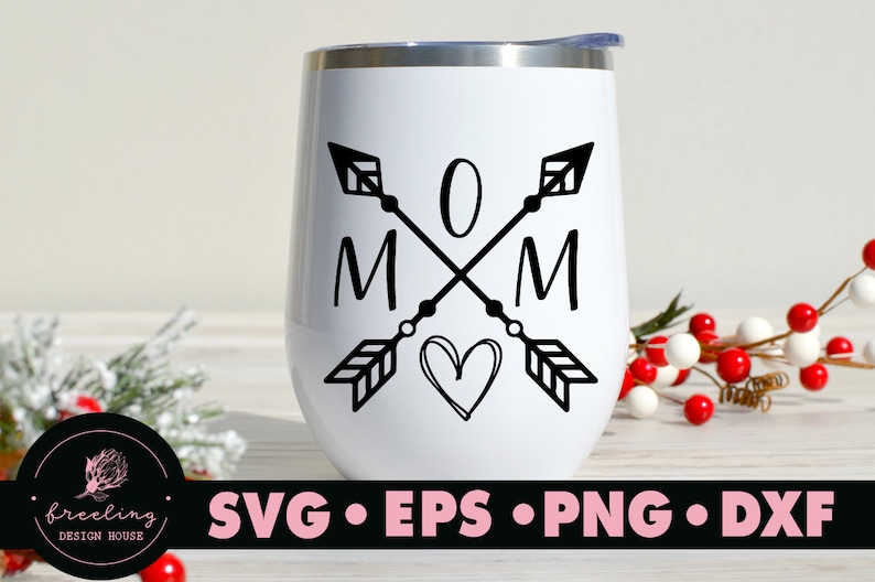 May include: White stainless steel tumbler with a black design of two arrows crossing with the word "MOM" and a heart in the center.