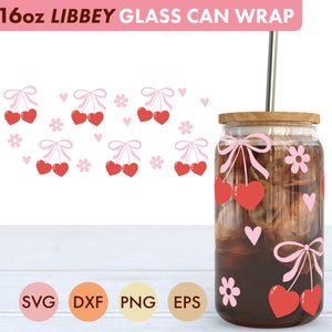May include: A 16oz glass can wrap with a design of pink bows and red cherries. The wrap is designed to fit a standard 16oz glass can. The wrap is shown on a glass can with a brown liquid inside. The can is sitting on a white wooden surface. The image also includes the words "SVG, DXF, PNG, EPS" in pink circles.