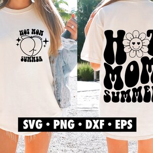 May include: A white t-shirt with a black graphic design that says "Hot Mom Summer" with a peach design. The graphic design is in a retro font style.