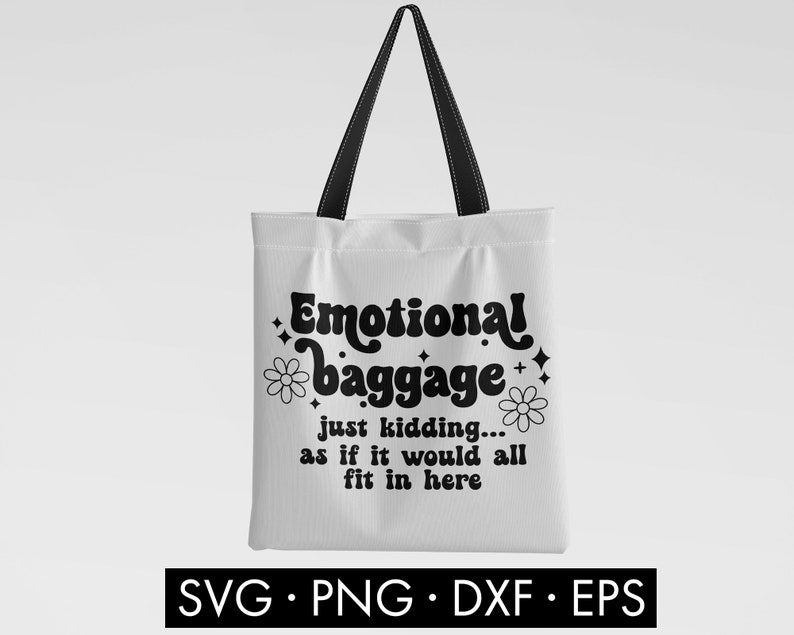 May include: White tote bag with black text that reads "Emotional baggage just kidding... as if it would all fit in here". The text is in a retro font style with a flower graphic on either side.