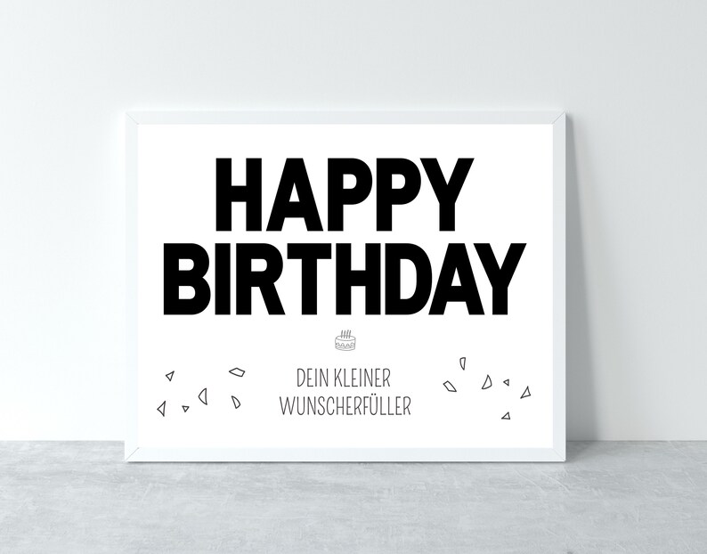 May include: White framed poster with black text that reads "Happy Birthday" and "Dein kleiner Wunscherrf&uuml;ller". The poster has a small cake icon with candles and a scattering of small triangles around the text.