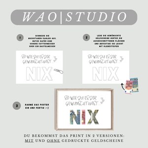 May include: A printable poster with instructions on how to create a "So wie du es dir gew&uuml;nscht hast... Nix" sign using cut-out banknotes. The poster is framed and shows the finished product with the banknotes in place.
