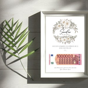 May include: A white framed print with a floral design and the name "Sandro" in cursive. The print also includes a 10 Euro bill with the text "1000000" printed on it. The text "Herzlichen Gl&uuml;ckwunsch zur Kommunion und zu deiner ersten Million" is also included on the print.
