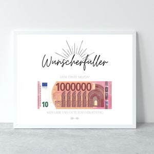 May include: A white framed print with a black and white illustration of a starburst. The text "Wunscherfuller" is written in black cursive script. Below the illustration is the text "DINE ERSTE MILLION!" in black text. A pink and green 10 euro bill is shown with the number "1000000" printed on it. The text "ALLES LIEBE UND GUTE ZUM GEBURTSTAG" is written in black text below the bill.