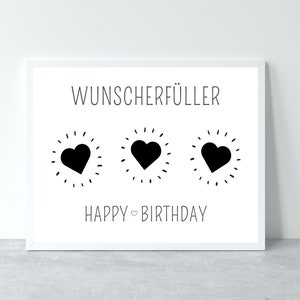 Puede incluir: Una tarjeta blanca con texto negro que dice "Wunschersch&uuml;ller" y "Feliz cumplea&ntilde;os". Hay tres corazones negros con contornos blancos en el centro de la tarjeta.