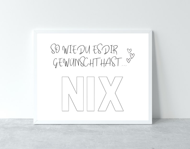 May include: White framed print with black text that reads "So wie du es dir gew&uuml;nscht hast... Nix" with three small hearts.