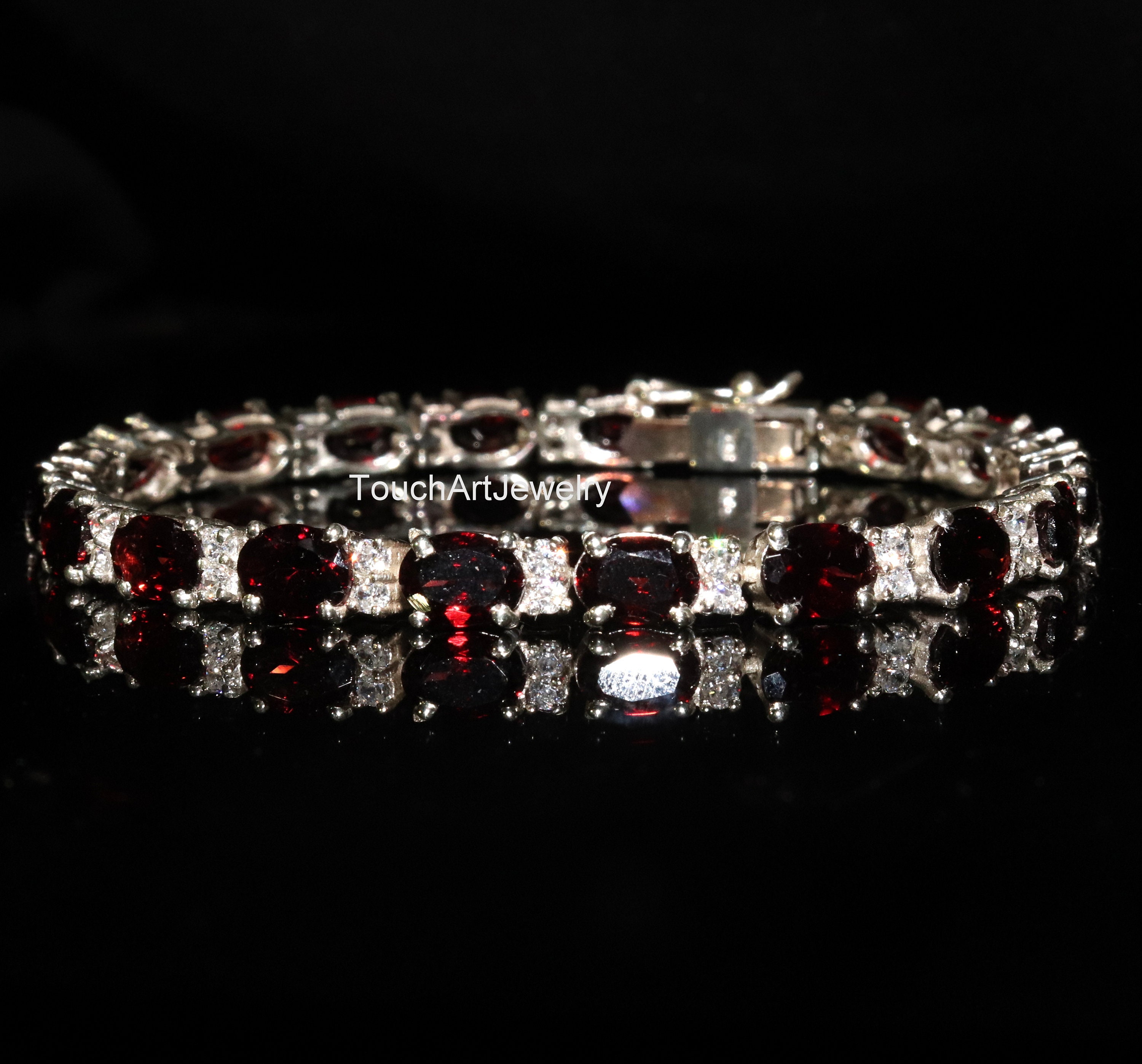 27.60 Carat Genuine Garnet .925 Sterling Silver Bracelet main image 0