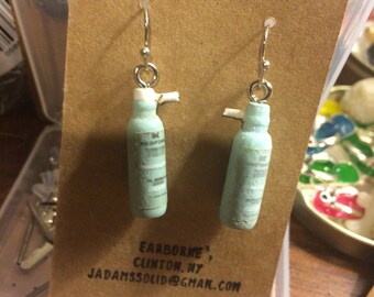 Novelty Earrings: Skin cream? Keep away from water--label will probably peel off.