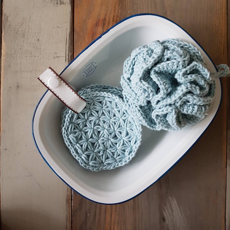 crochet shower pouf and face scrubbies in baby blue color