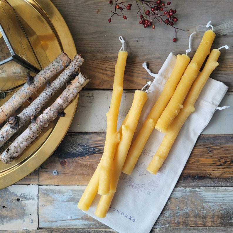 6 candles of birch branch beeswax taper candles, with actual birch branches that I made mold from, it shows with cotton pouch for package