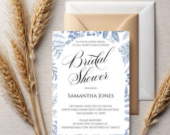 May include: A white bridal shower invitation with blue floral illustrations and the text "Bridal Shower" in black cursive font. The invitation includes the bride's name, date, time, location, and RSVP information.