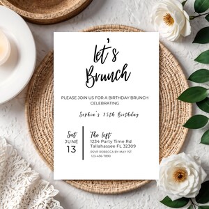 May include: A white invitation card with black text that reads "let's Brunch" and "Please join us for a birthday brunch celebrating Sophia's 25th birthday". The card also includes the date, time, location, and RSVP information.