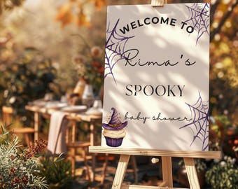 Spooky Baby Shower Welcome Sign – Halloween-Themed Printable with Witch Hat Cupcake & Purple Webs