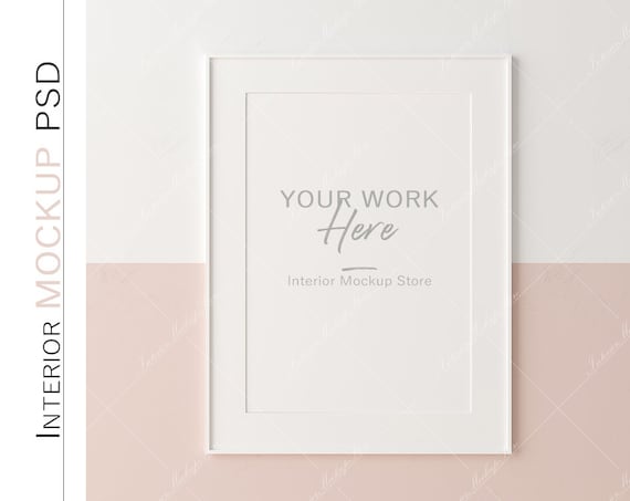 Mockup poster frame close up on wall painted white and pastel pink color,  Minimalist mockup, Children room, Nursery mockup