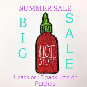 May include: Embroidered patch featuring a red hot sauce bottle with the words "HOT STUFF" in white. The patch has a green cap and black border. Text above reads "SUMMER SALE BIG SALE". The patch is available in packs of 1 or 10.