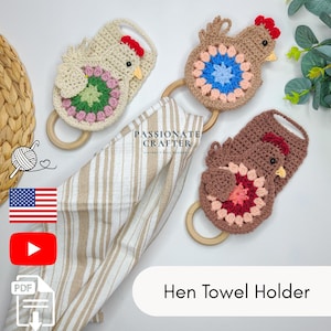 May include: Three crocheted hen towel holders with wooden rings, featuring cream, tan, and brown yarn bodies with colorful granny square centers. A beige and white striped kitchen towel hangs from one ring. Text reads PASSIONATE CRAFTER.