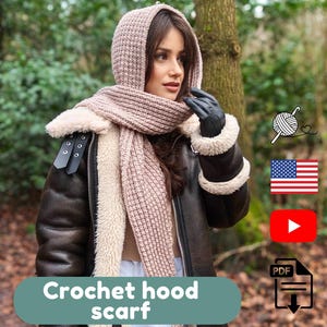 May include: A light brown crochet hood scarf. The scarf is worn over the head and around the neck. The scarf is made of a soft, textured yarn. The image also includes a brown leather jacket with a cream-coloured shearling lining. The text "Crochet hood scarf" is at the bottom.