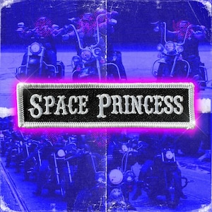 May include: A black and white patch with the text "SPACE PRINCESS" in white lettering. The patch is surrounded by a pink neon glow and is set against a blue and white background with a blurred image of motorcycles.