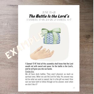May include: A printed page with the text "The Battle Is the Lord's" and related Bible verses. The page features a watercolor illustration of a gift box with a green bow and open hands. The text includes a scripture and a reflection prompt.