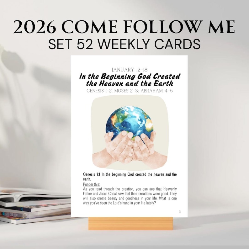 May include: A white card with the text "2026 COME FOLLOW ME SET 52 WEEKLY CARDS" and "JANUARY 12-18". The card features an illustration of hands holding a globe. The text reads "In the Beginning God Created the Heaven and the Earth".