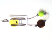 Chunky pendant necklace of upcycled treasures on grey faux suede thong- raw crystal, wood and neon beads.