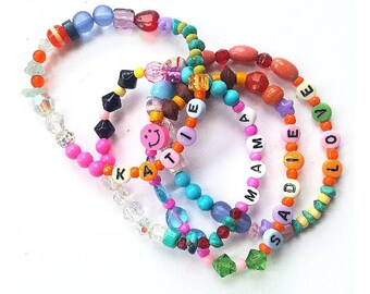 Personalised customised beaded name bracelets. Stacking arm candy rainbow colour pop 80s 90s upcycled and vintage beads.