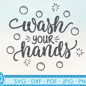 May include: A black and white graphic design with the text "Wash your hands" in a cursive font. The design is surrounded by small circles and stars.