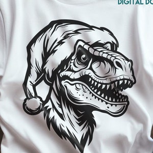 T-rex Navidad SVG, Dinosaurio Navidad svg Archivo de corte, Imágenes prediseñadas navideñas T-rex, Diseño festivo de Dino, Dinosaurio de Navidad