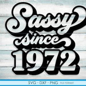May include: Black and white graphic design with the text "Sassy since 1972" in a retro font style.