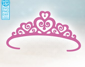 May include: A pink tiara with a heart-shaped design and intricate swirls. The tiara is a popular accessory for princess-themed parties and costumes.